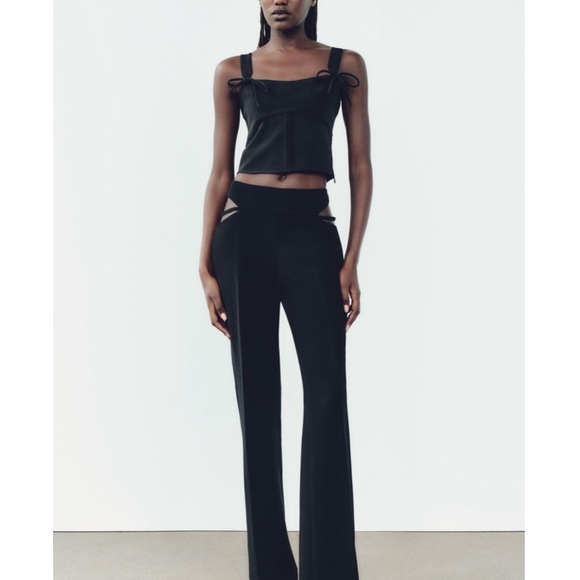 CUT OUT PANTS BLACK. SIZE XL